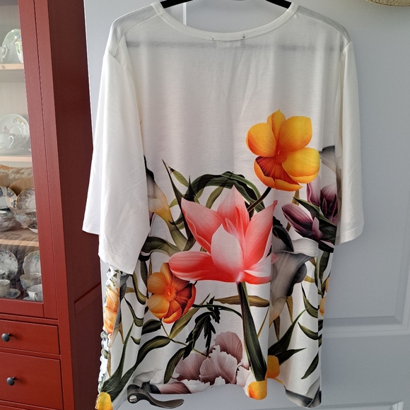 Polyester, tropical print top from Claire France. It has 3/4 sleeves and is size - Picture 2 of 4